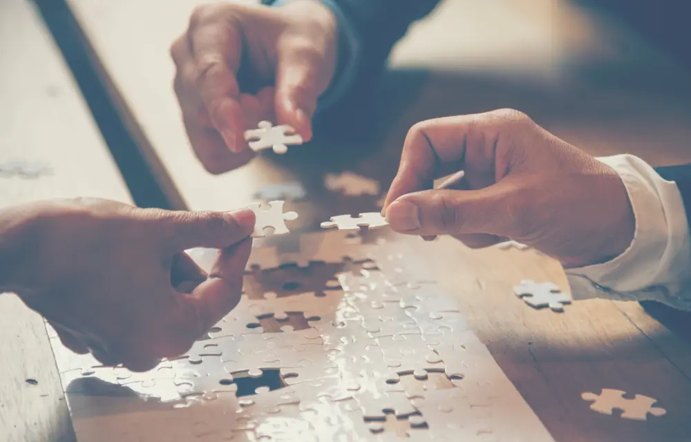 An image of assembling a puzzle.